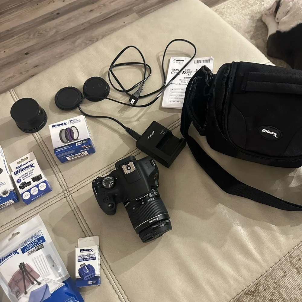 Canon DSLR Camera in Black with Attached Lens